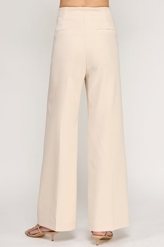 Conjunto elegante beige con de corset y pantalón